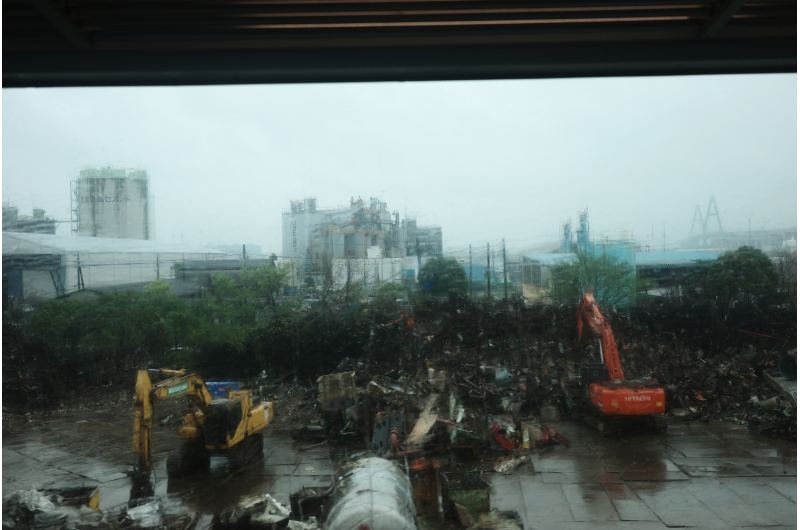 A rainy-day construction sites along Nagoya port.