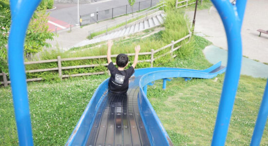 Kid is enjoying the slide.