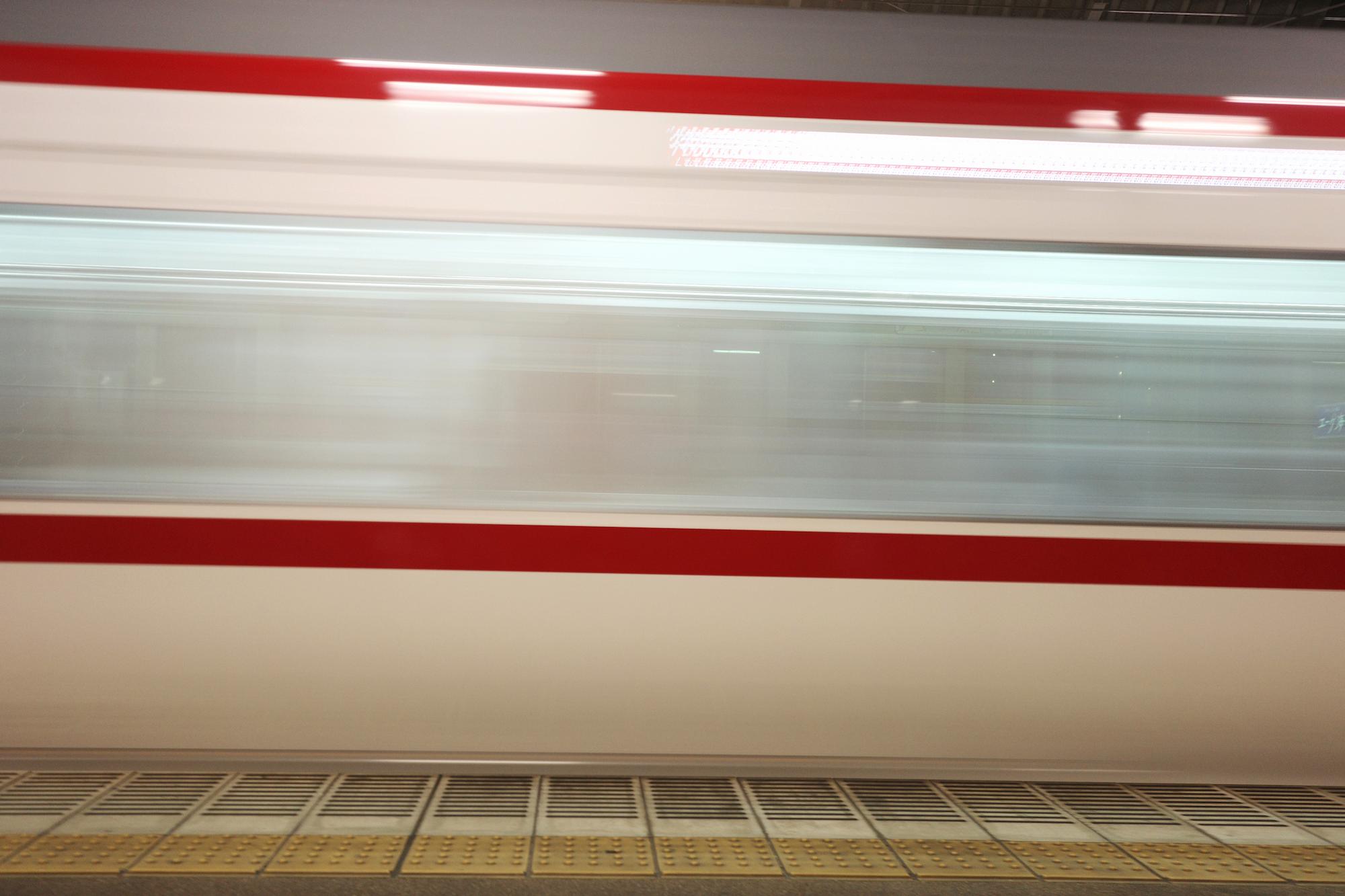 The trains approaches to Shibata station. 