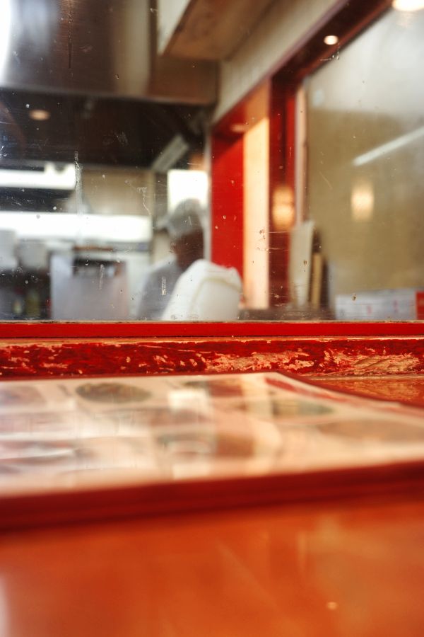 Chef cooking seen from counter seat at Misen one the best ramen store in Nagoya.