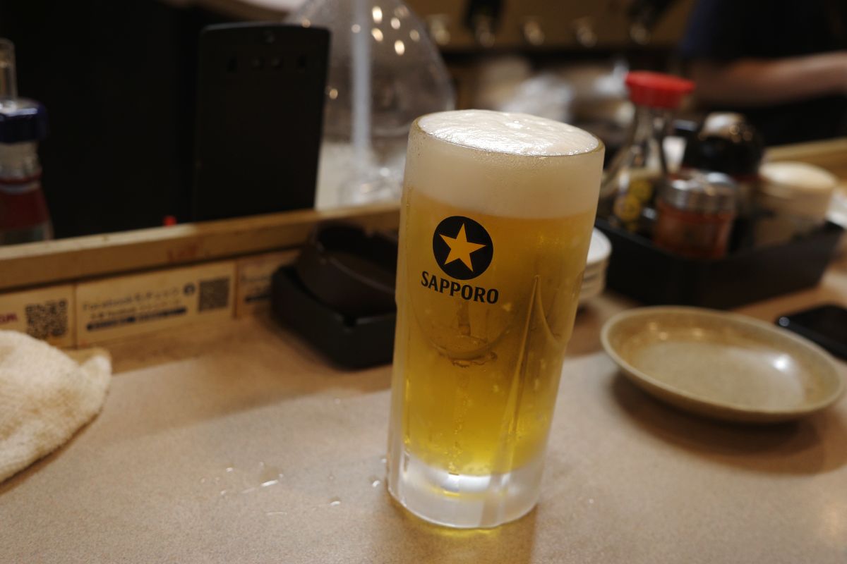 Cold Sapporo draft beer at Daiyasu in Nagoya.