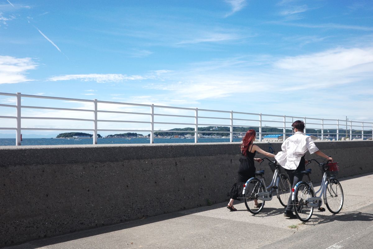 A Young Couple Cycling Around the Island of Himakajima.