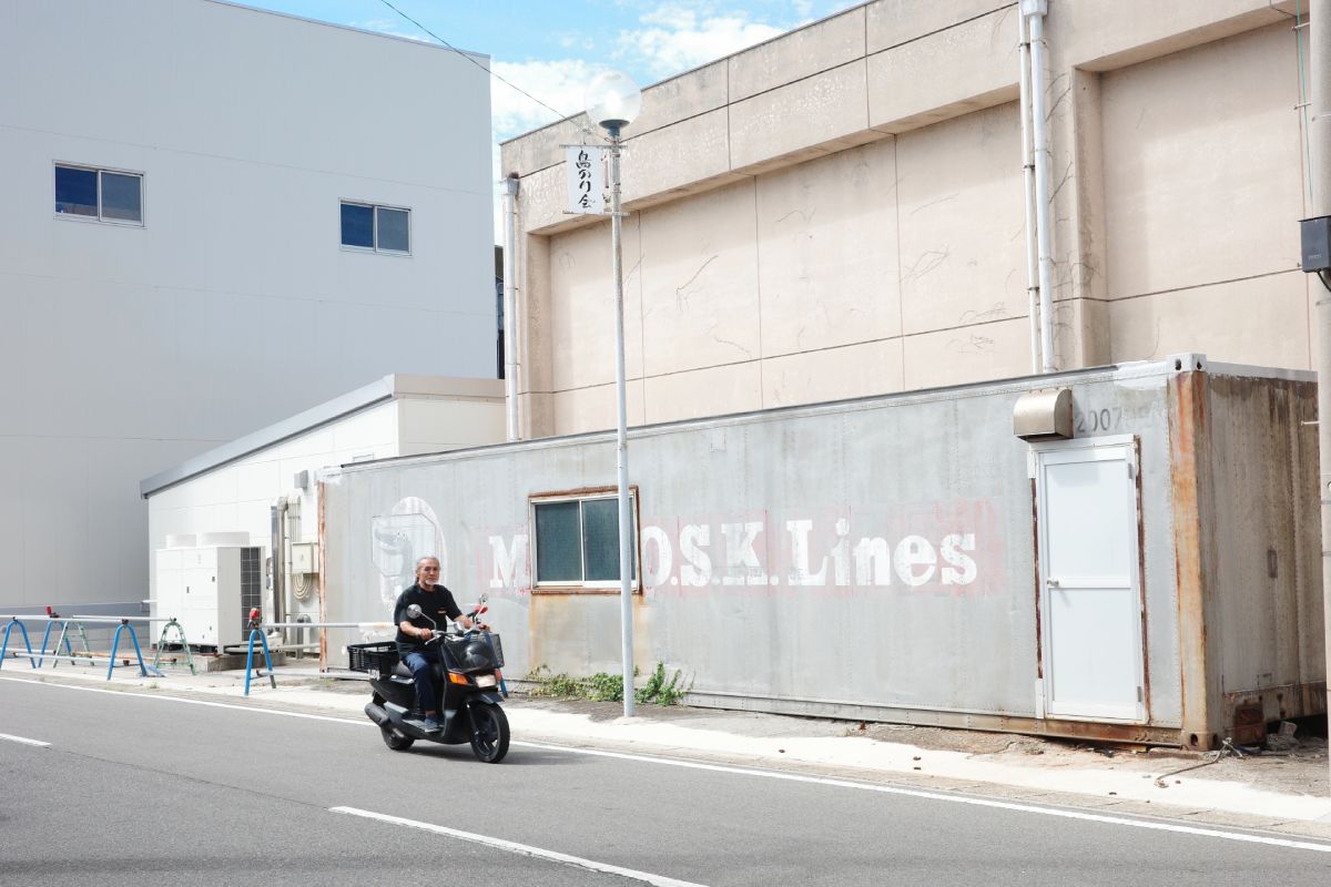 "Old Man Riding a Motorcycle on Himakajima Island.