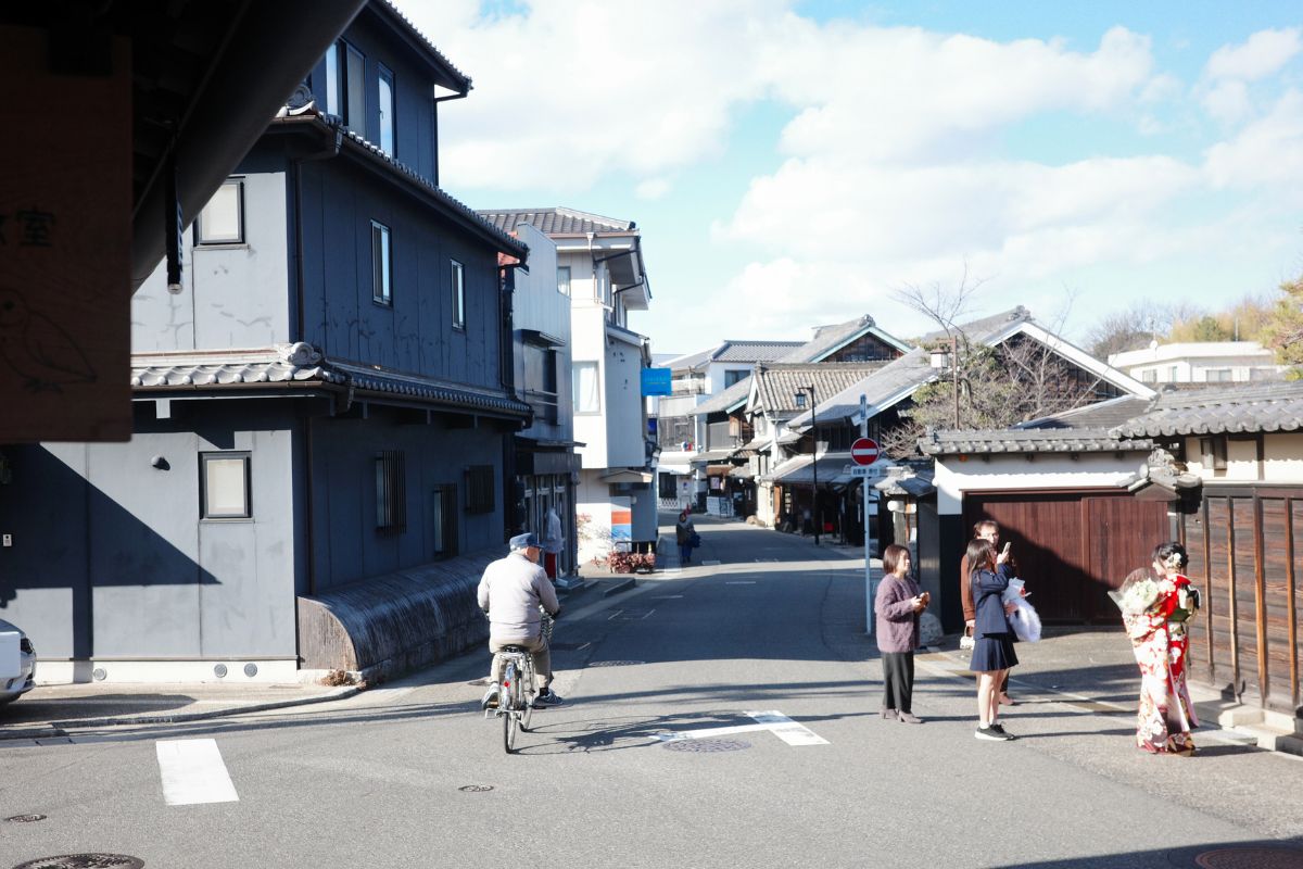 Local residents in Arimatsu celebrating Coming-of-Age Day wearing traditional furisode