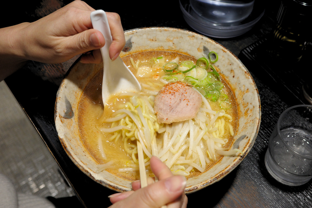 Savoring ramen delights at Hachiryu in Nagoya, a haven for local noodle enthusiasts.