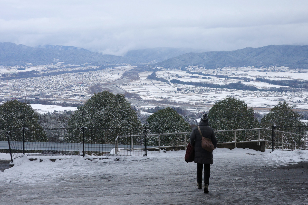 Panoramic view of Ina City, a breathtaking sight from Ina Ski Resort.